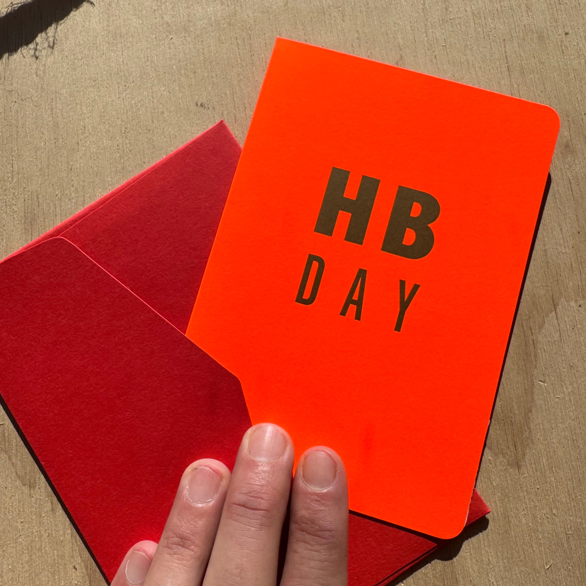 FOLDED CARD H B DAY FLUO ORANGE + CARMINE ENVELOPE by Le Typographe